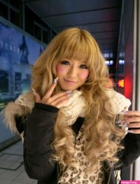 Download Stylish Gyaru Girl Posing Outdoors Wallpaper