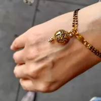 Shop Antique Gold Ball Hand Mangalsutra Bracelets in USA