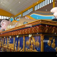 Reclining Buddha in Wat Chaiya Mangalaram Penang Malaysia Stock Photo