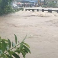 Woman Swept Away In Floodwaters As Heavy Rains Wreak Havoc In Mulugu
